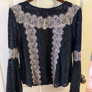 ElegantNavy Lace Top with White Accents